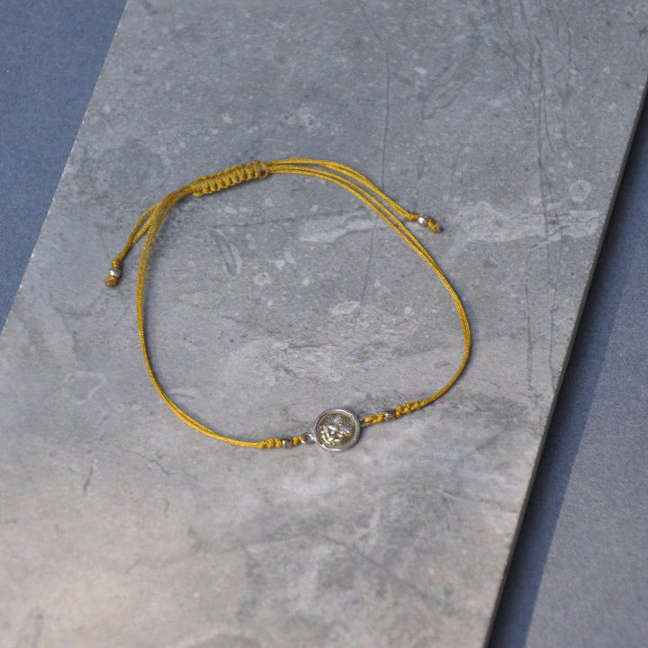 Pulsera angelito amarilla