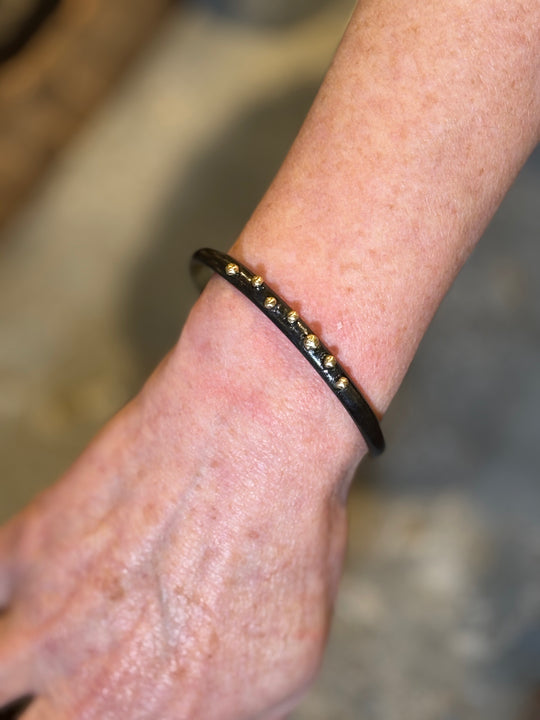 Pulsera Negro Dorado - BRONCE