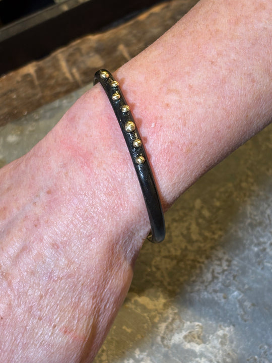 Pulsera Negro Dorado - BRONCE