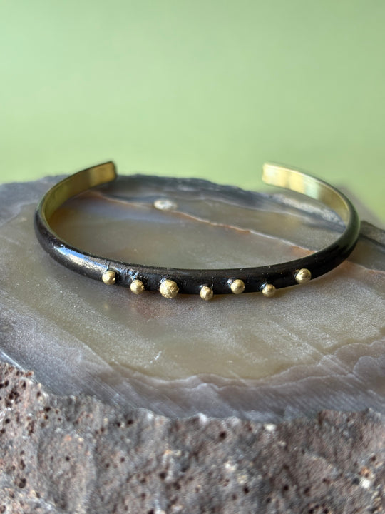 Pulsera Negro Dorado - BRONCE