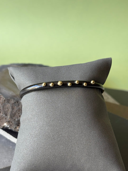 Pulsera Negro Dorado - BRONCE